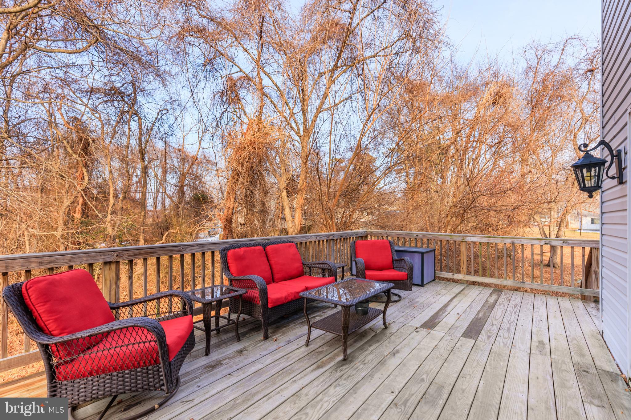 326 South Carolina Road Stevensville, MD 21666 - Photo 33 of 48 a view of sitting area with furniture on wooden deck