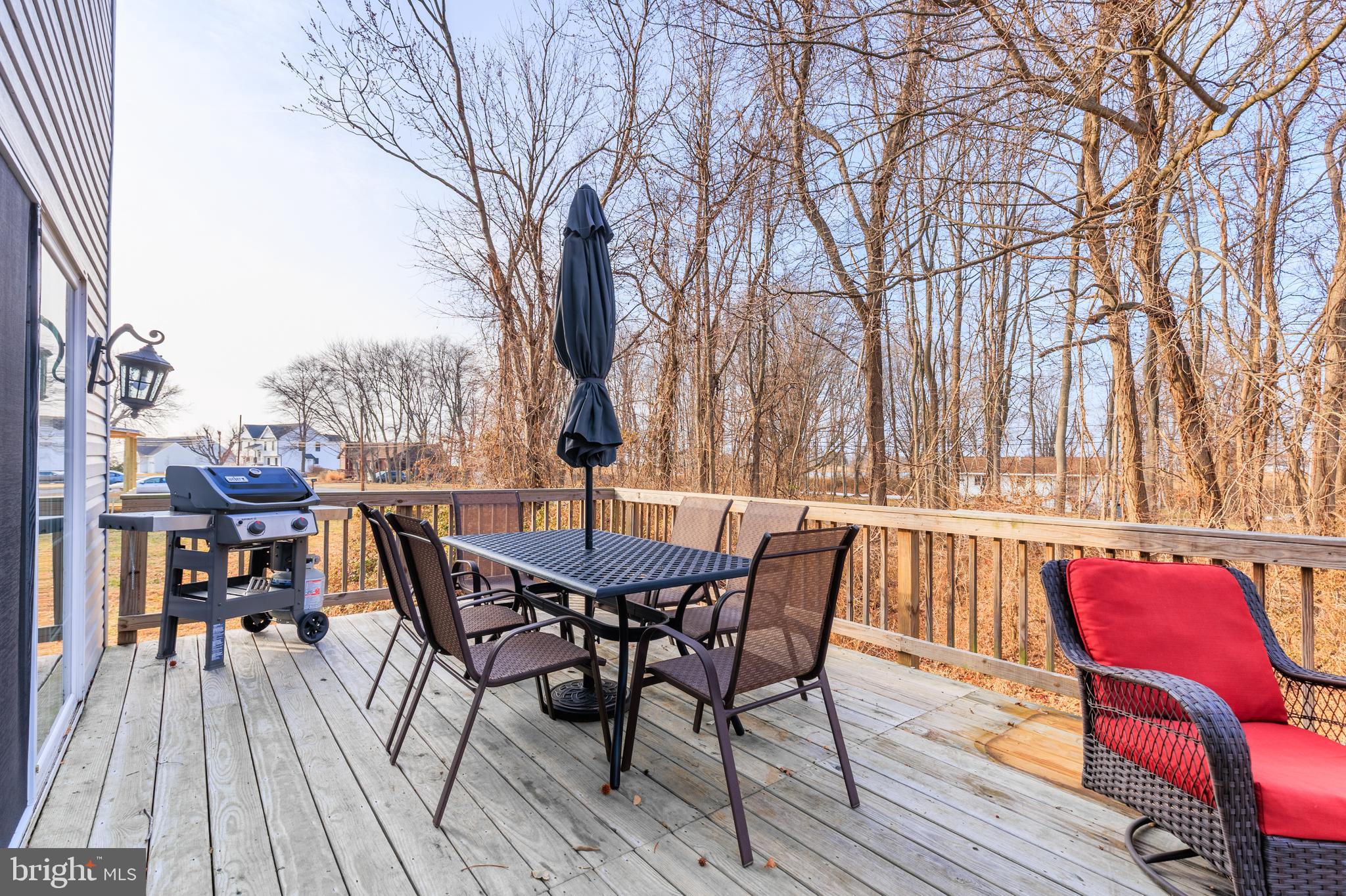 326 South Carolina Road Stevensville, MD 21666 - Photo 34 of 48 a view of a patio with a table and chairs