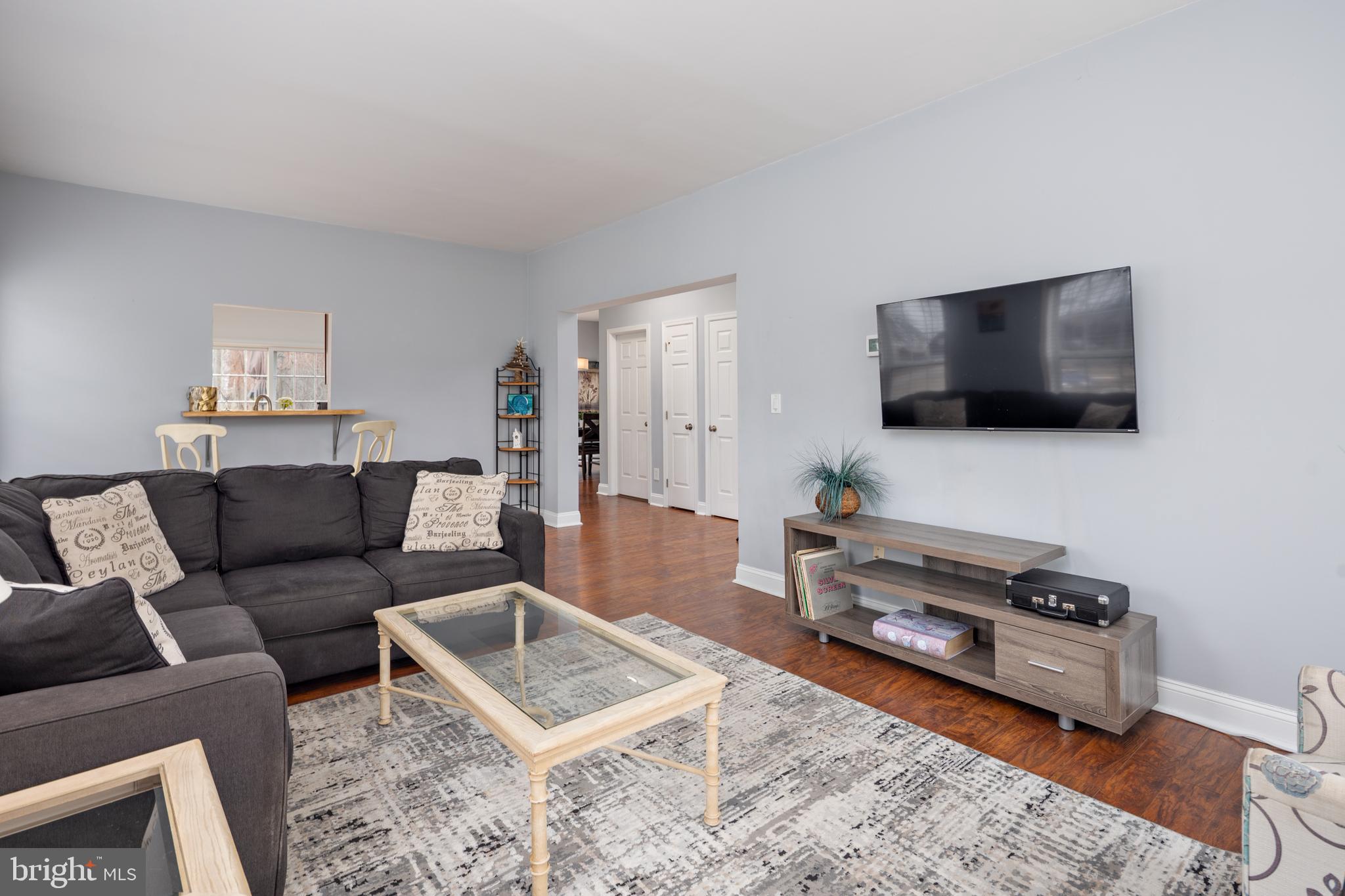 326 South Carolina Road Stevensville, MD 21666 - Photo 4 of 48 a living room with furniture and a flat screen tv