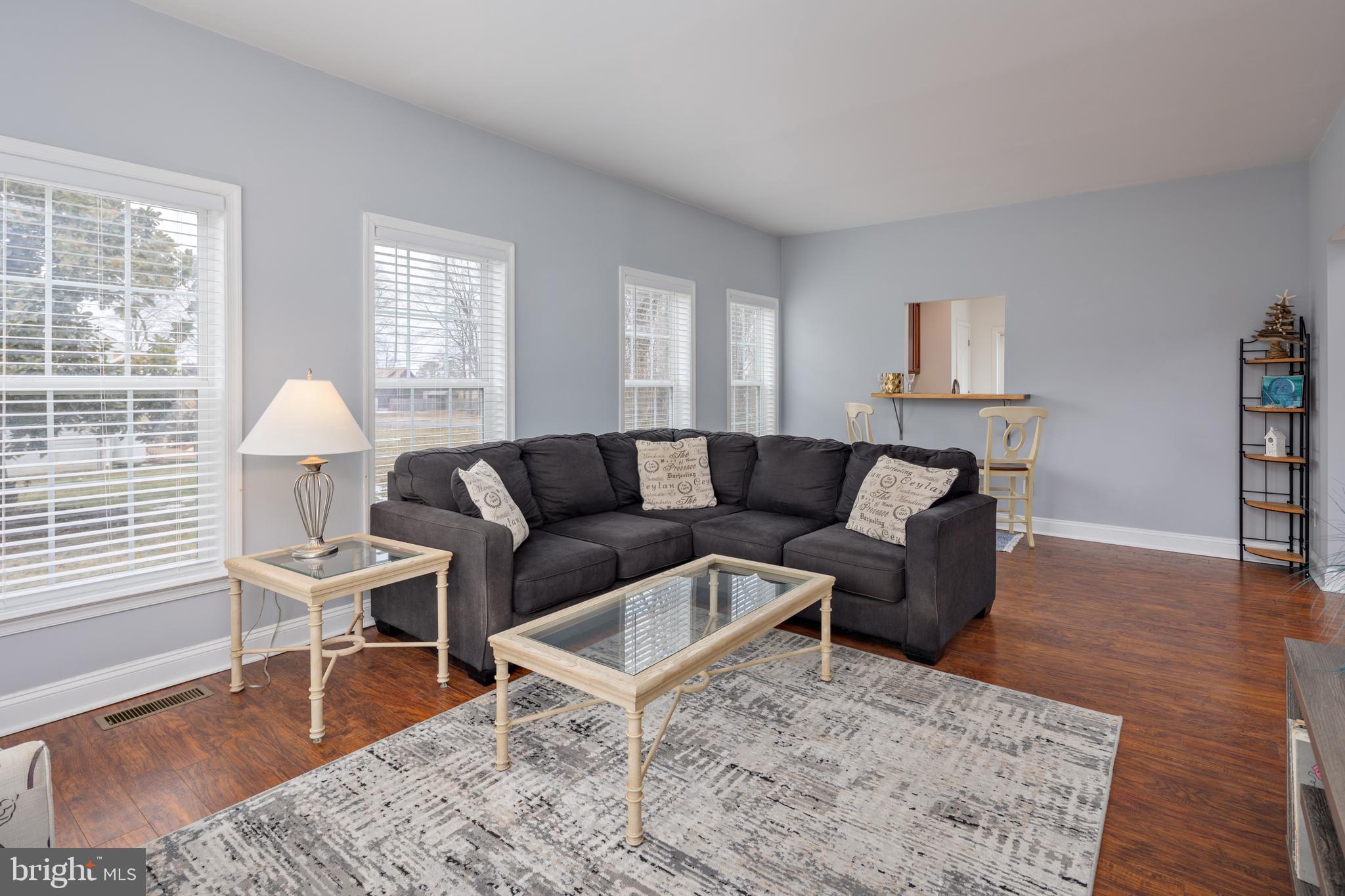 326 South Carolina Road Stevensville, MD 21666 - Photo 5 of 48 a living room with furniture and a wooden floor