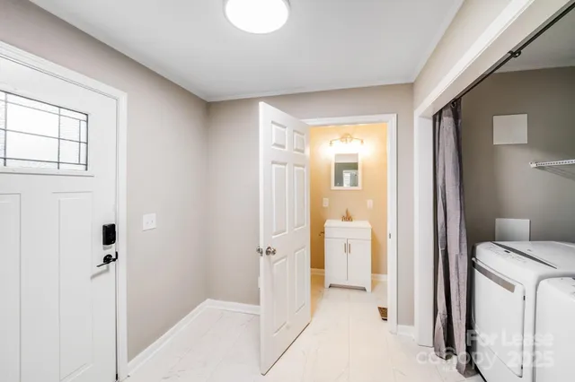 a bathroom with a shower and a toilet