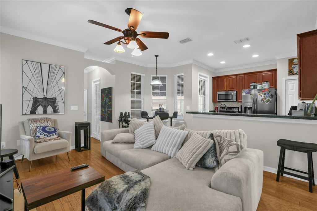 2165 Ridgewood Street Orlando, FL 32803 - Photo 5 of 37 a living room with furniture and a large window