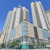 a view of a city with tall buildings