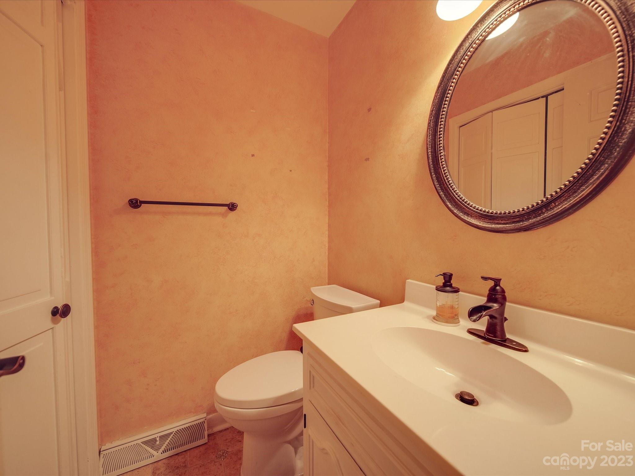1296 Craig Avenue Lancaster, SC 29720 - Photo 12 of 31 a bathroom with a sink and a mirror