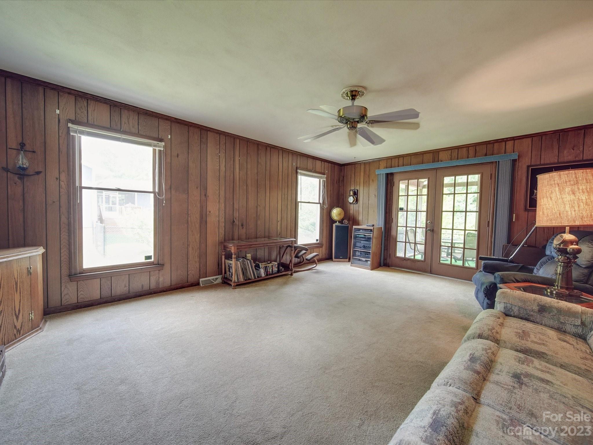 1296 Craig Avenue Lancaster, SC 29720 - Photo 17 of 31 a view of a livingroom with a ceiling fan and window