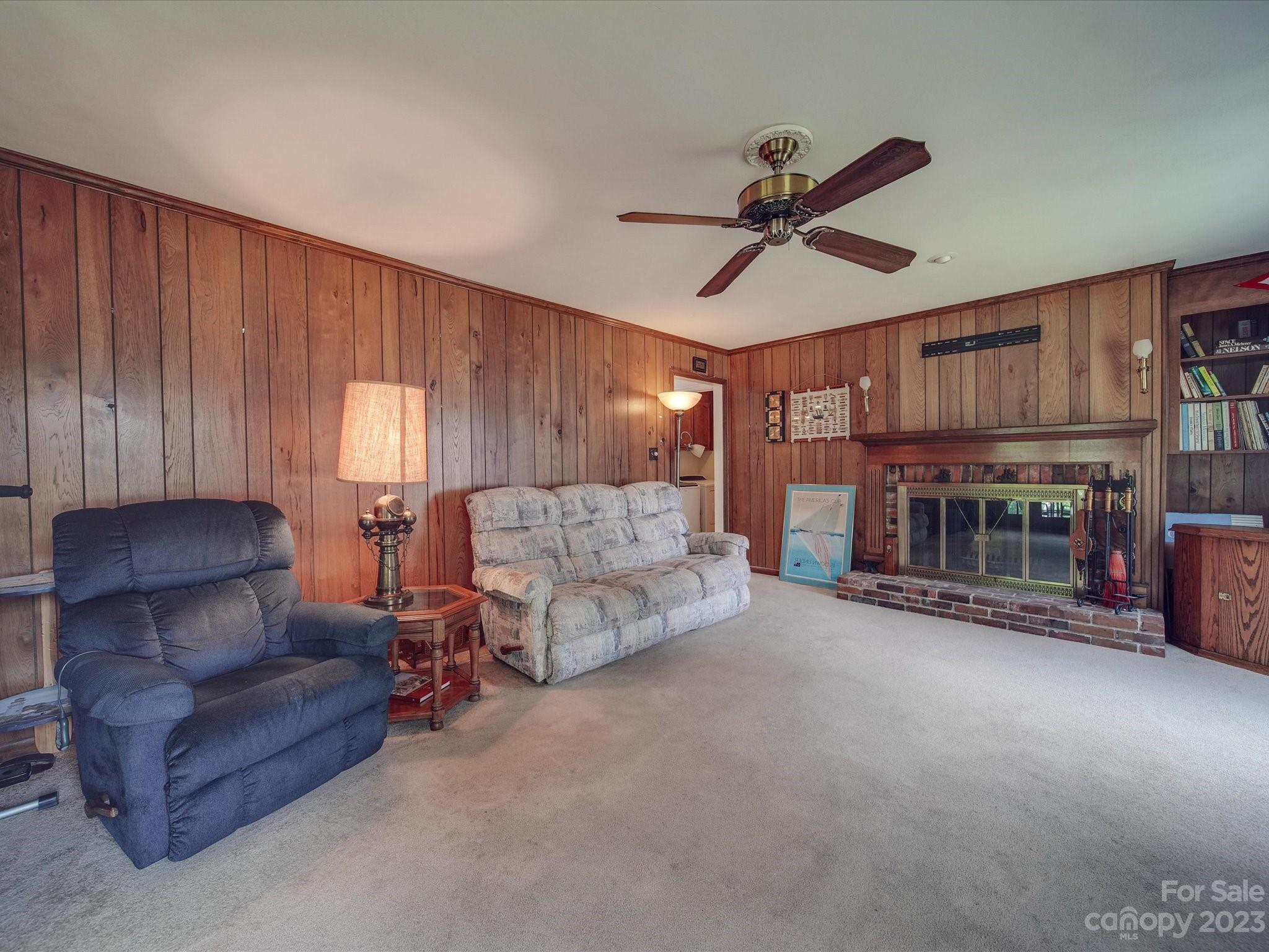 1296 Craig Avenue Lancaster, SC 29720 - Photo 18 of 31 a living room with furniture and a ceiling fan