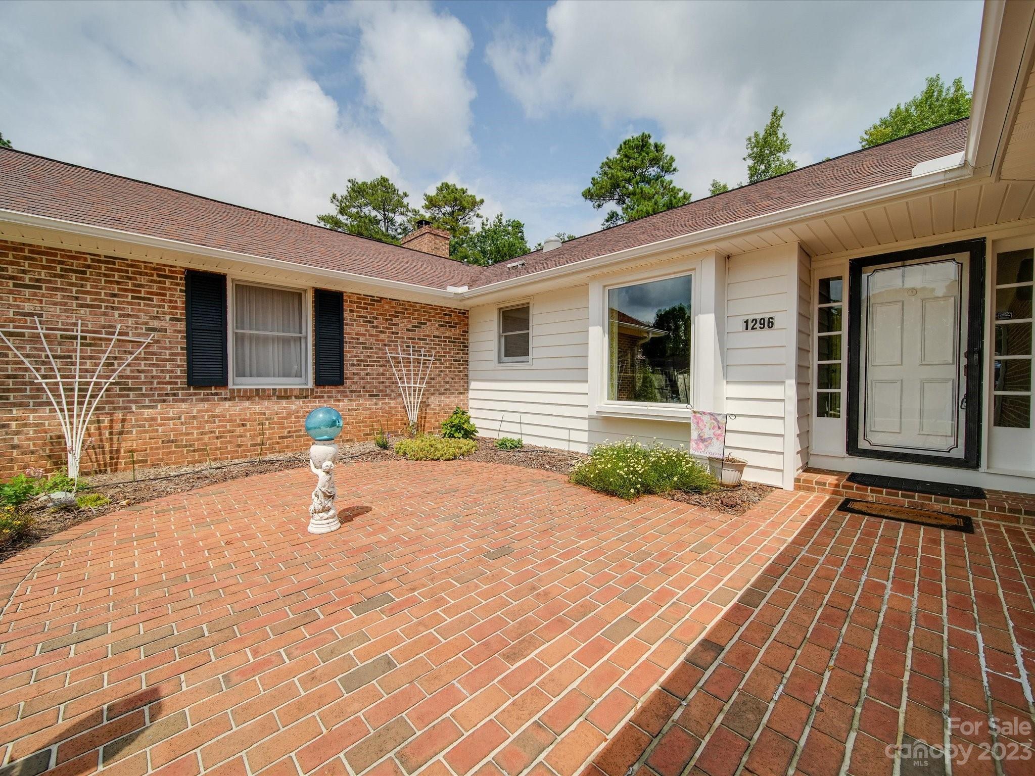 1296 Craig Avenue Lancaster, SC 29720 - Photo 2 of 31 a front view of a house with a yard