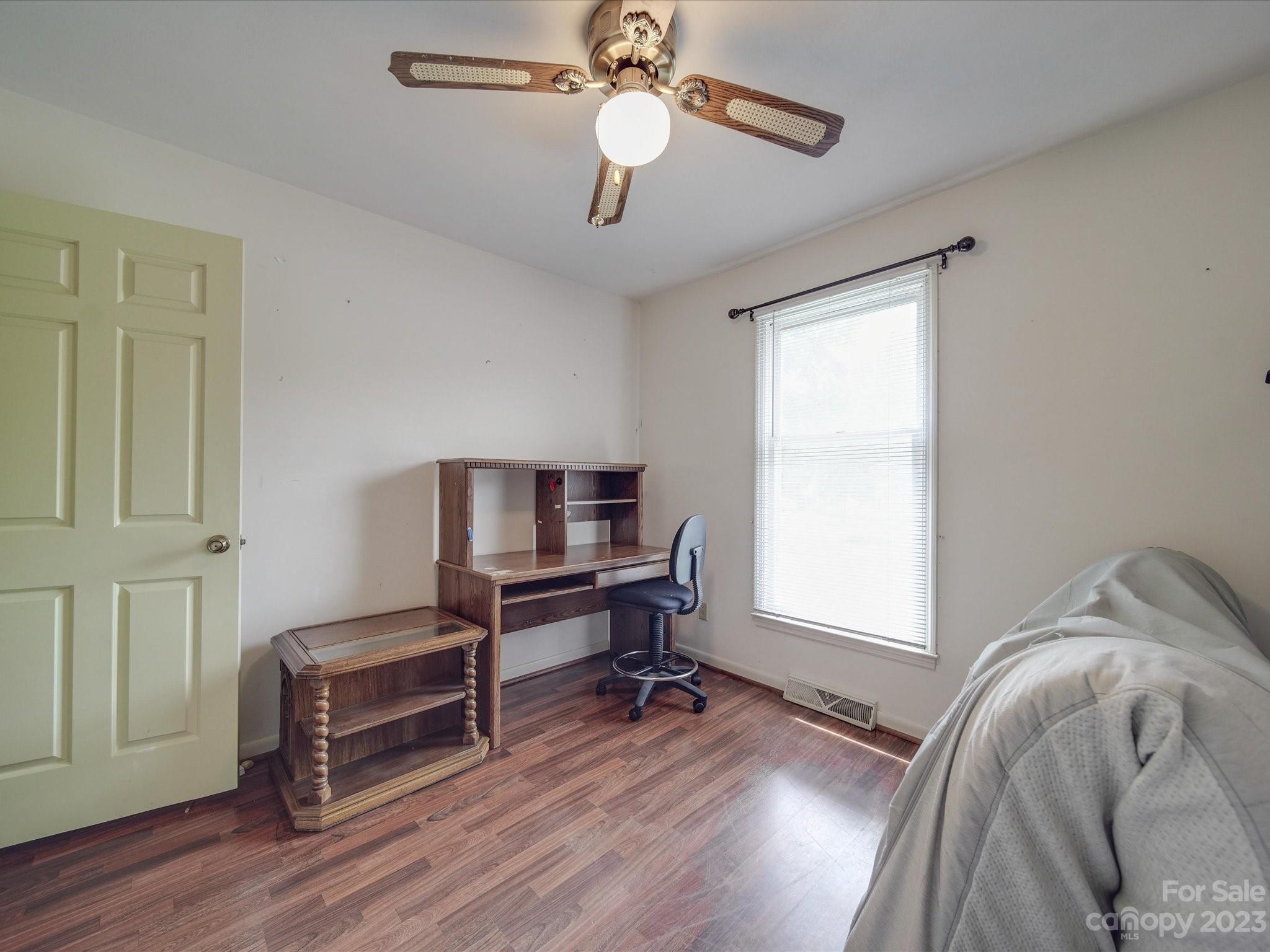1296 Craig Avenue Lancaster, SC 29720 - Photo 24 of 31 a view of a workspace with furniture and a window