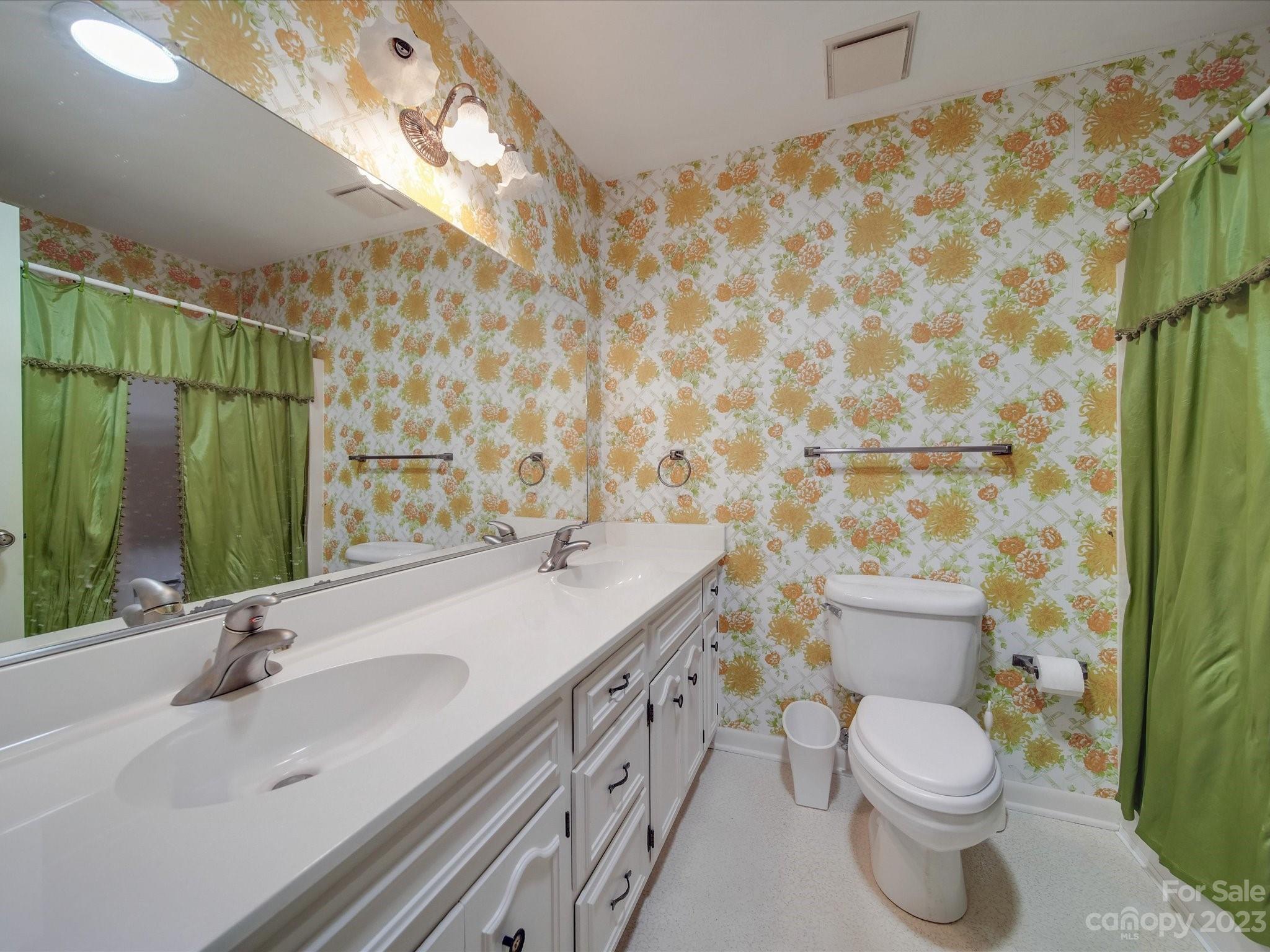 1296 Craig Avenue Lancaster, SC 29720 - Photo 29 of 31 a bathroom with a sink toilet and shower