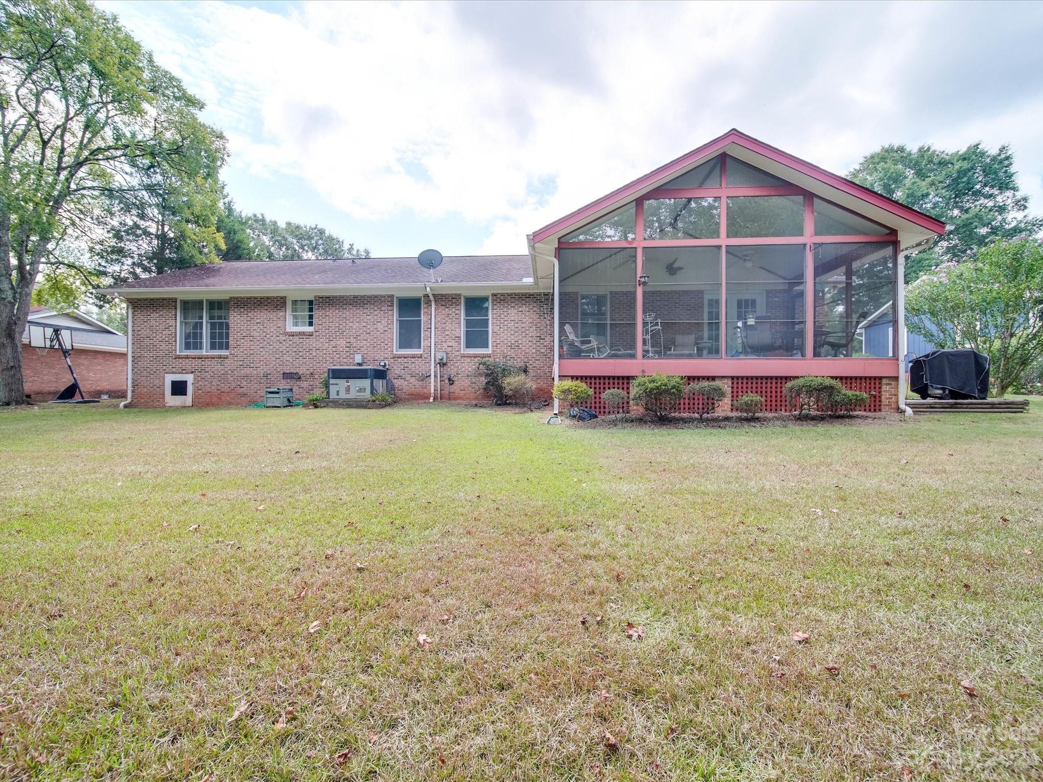 1296 Craig Avenue Lancaster, SC 29720 - Photo 3 of 31 a view of a house with a yard and sitting area