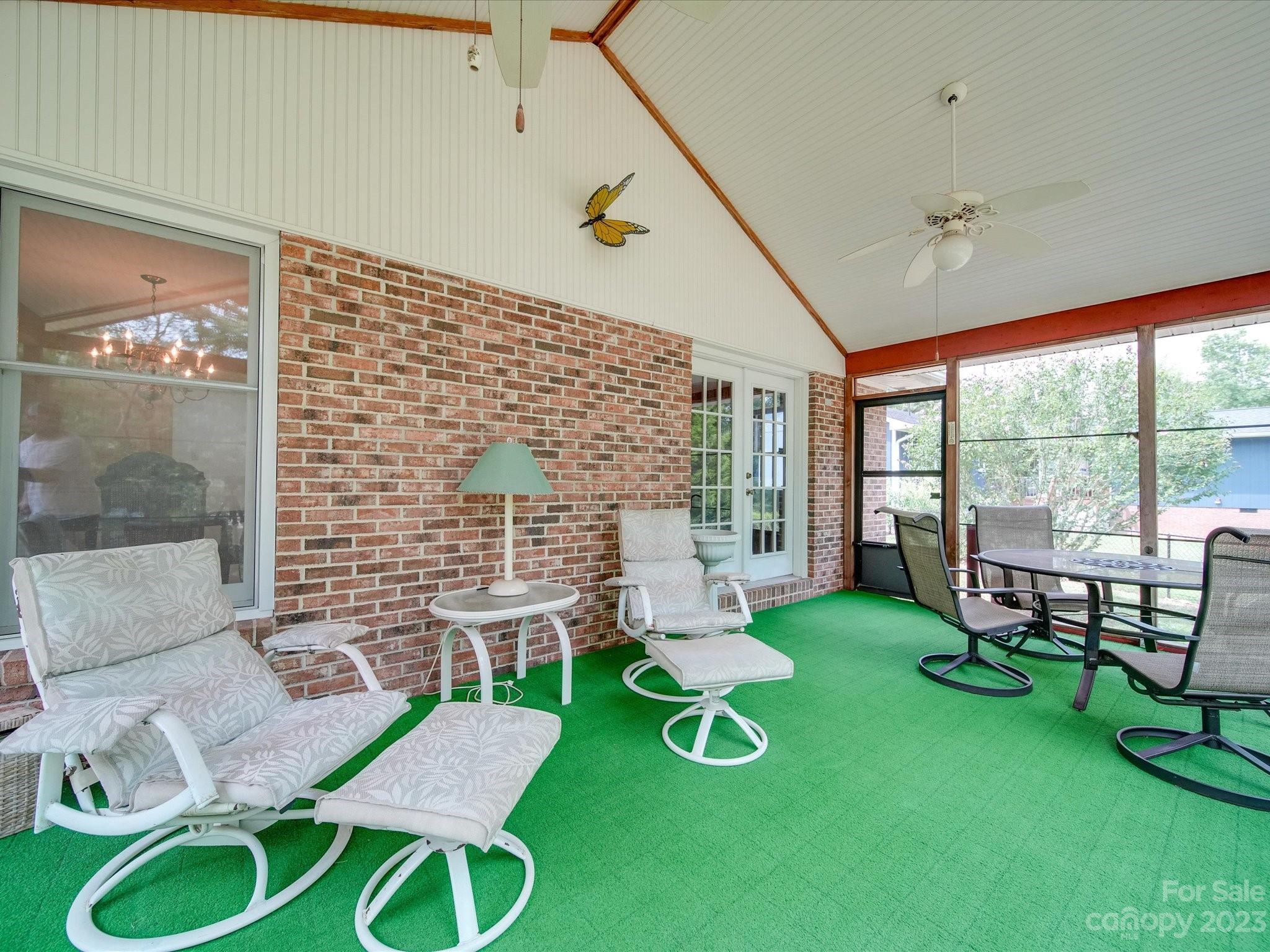 1296 Craig Avenue Lancaster, SC 29720 - Photo 31 of 31 a living room with furniture a rug and white walls