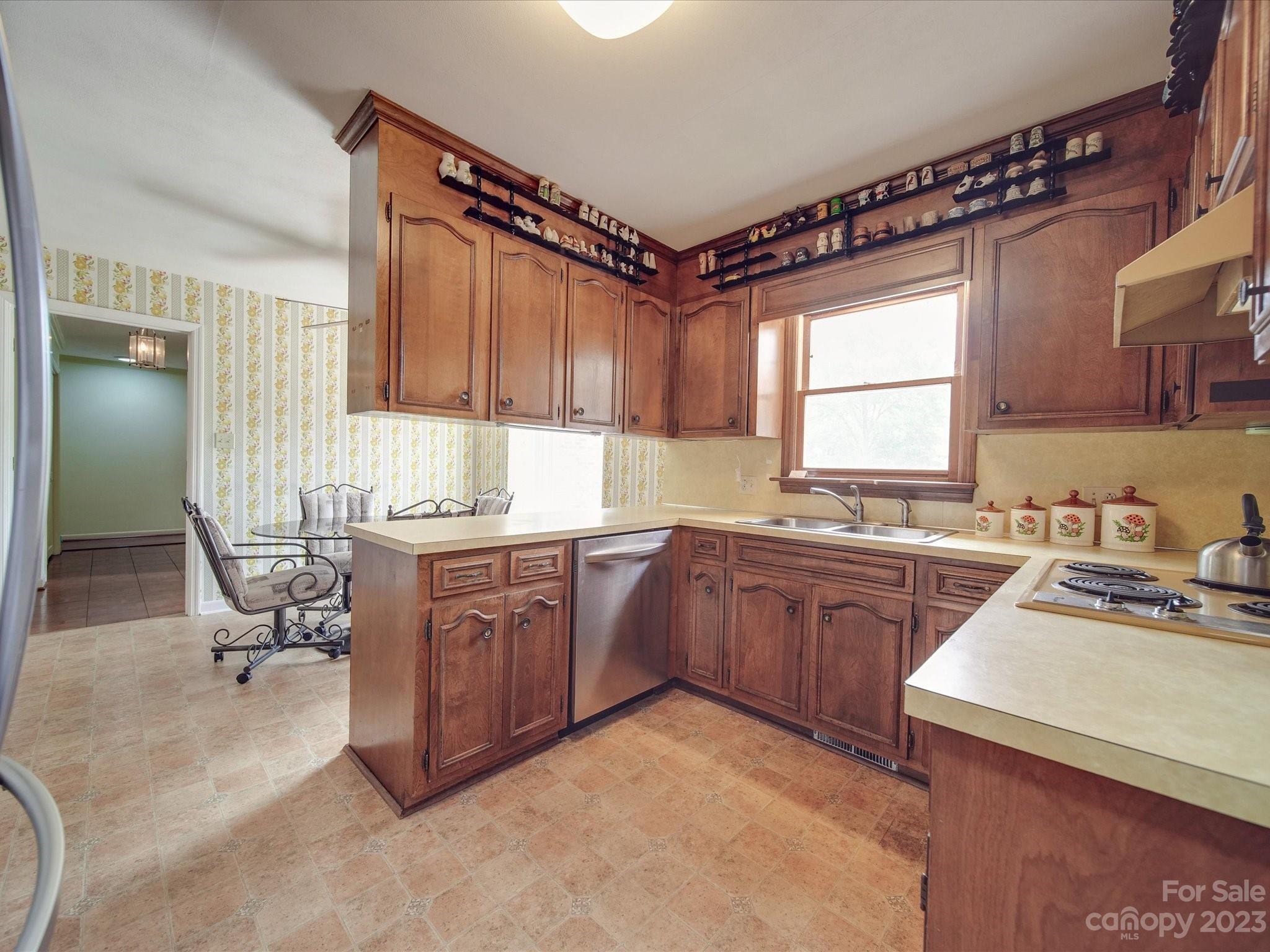 1296 Craig Avenue Lancaster, SC 29720 - Photo 9 of 31 a kitchen with a sink appliances cabinets and a window