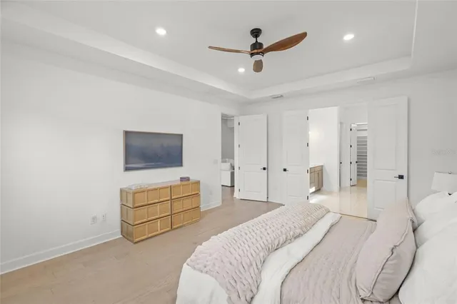 a bathroom with a shower and a glass door