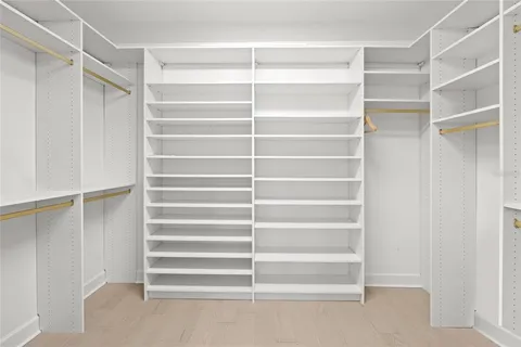 a bedroom with a bed and a furniture