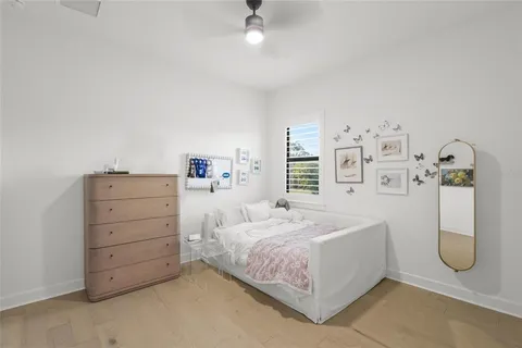 a view of a hallway with two windows