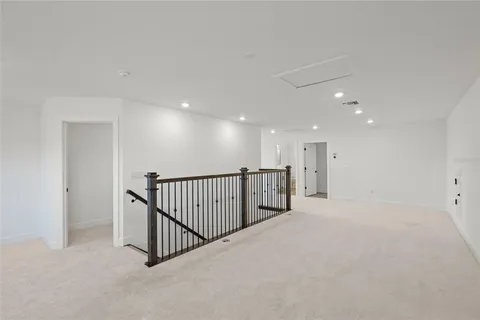 a living room with furniture and a garden