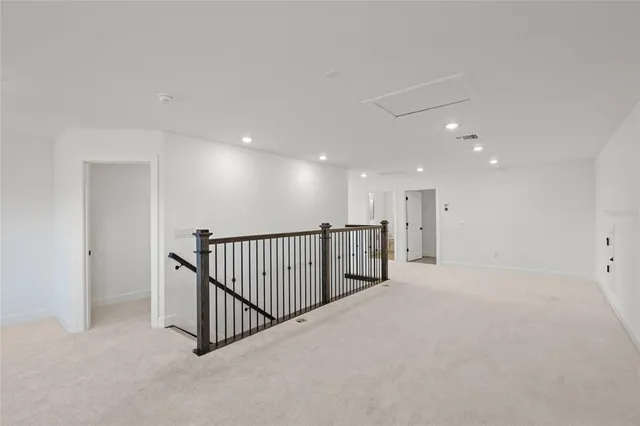 a living room with furniture and a garden