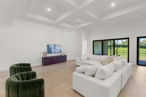 a large kitchen with a table and chairs in it