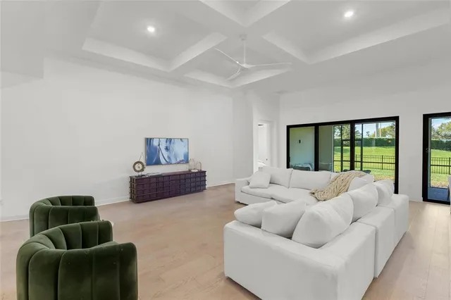 a large kitchen with a table and chairs in it