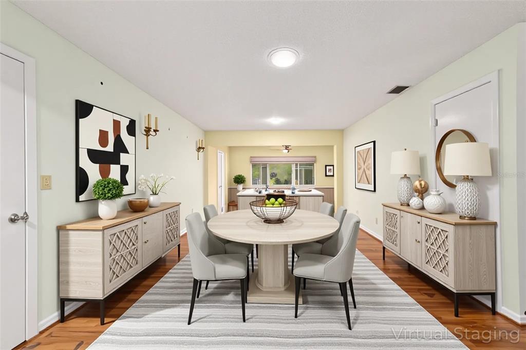 8678 Southwest 95 Street, Unit D Ocala, FL 34481 - Photo 10 of 36 a view of a dining room with furniture
