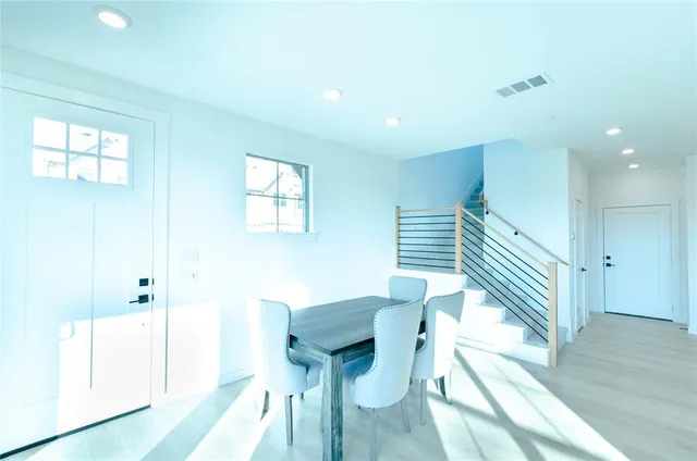 a view of a hallway with seating area