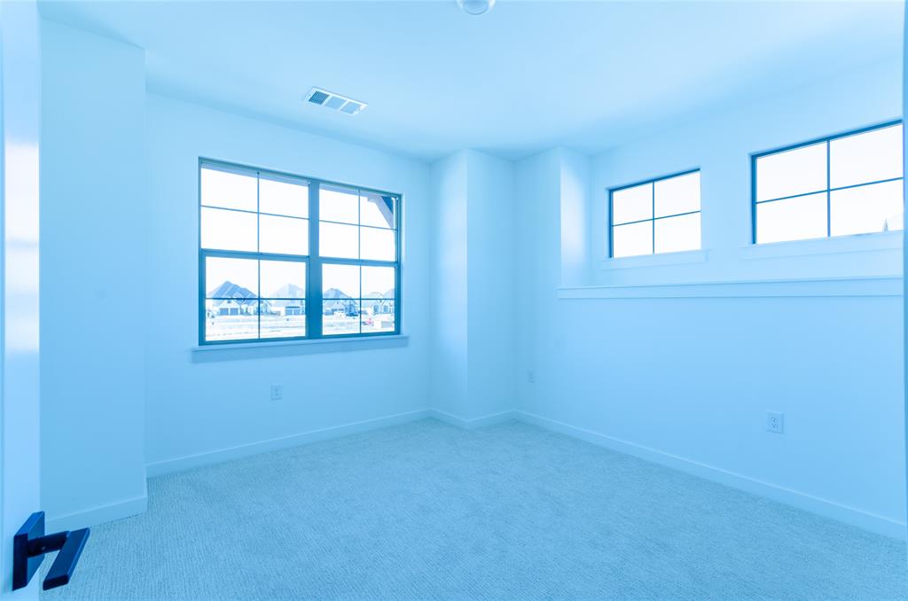 1248 Armstrong The Colony, TX 75056 - Photo 18 of 25 an empty room with windows