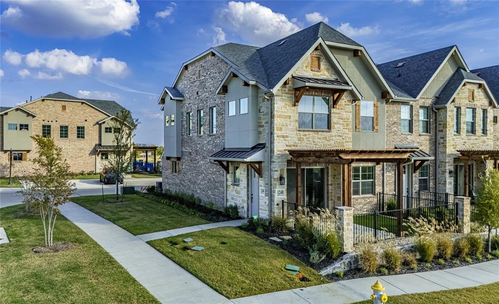 1248 Armstrong The Colony, TX 75056 - Photo 23 of 25 a front view of a house with garden