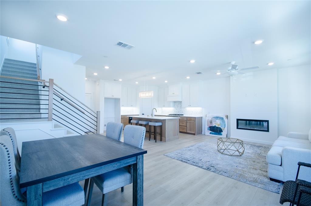 1248 Armstrong The Colony, TX 75056 - Photo 6 of 25 a living room with lots of furniture and view of kitchen