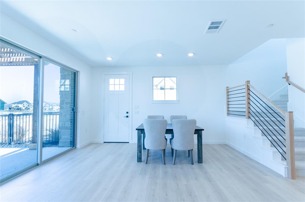 1248 Armstrong The Colony, TX 75056 - Photo 9 of 25 a dining room with furniture and wooden floor