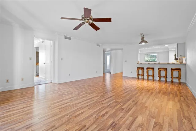a view of a livingroom with a hardwood floor