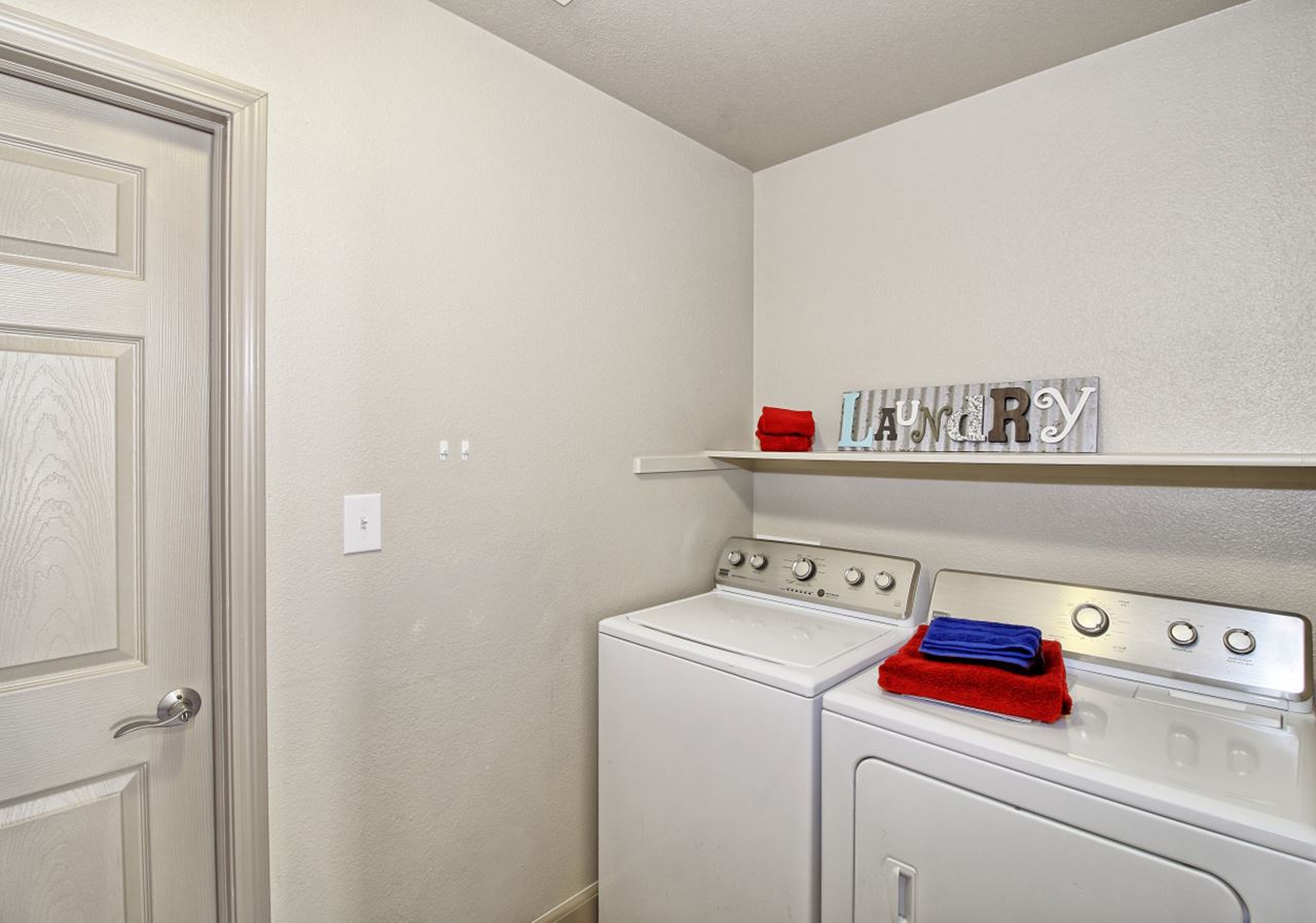 199 Red Rocks Street Fruita, CO 81521 - Photo 14 of 25 a utility room with dryer and washer