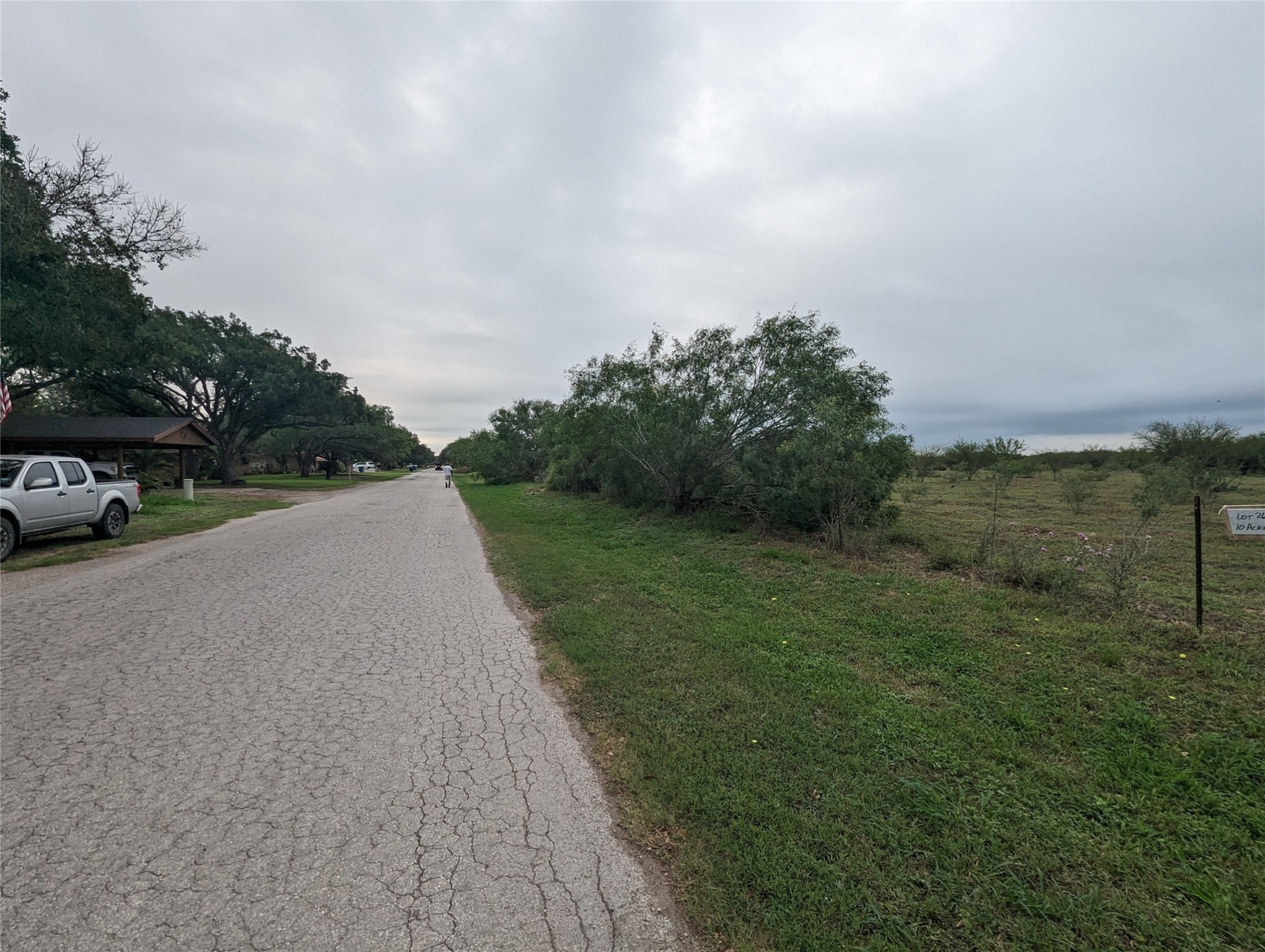 Lot 28 Southwest 10th Street Premont, TX 78375 - Photo 6 of 12 a view of a road with a yard