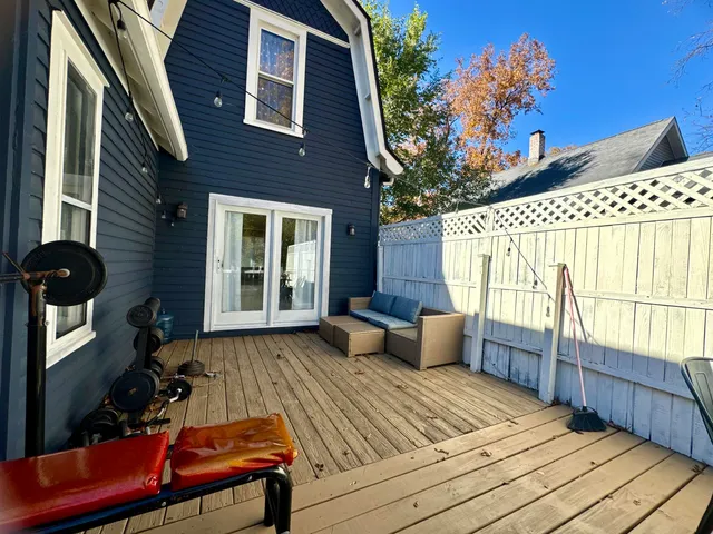 a view of a dinning tables and chairs in the balcony