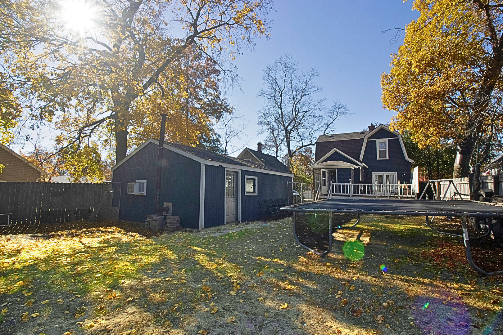 641 Aberdeen Street Marseilles, IL 61341 - Photo 23 of 28 a front view of a house with a yard large tree and a large window