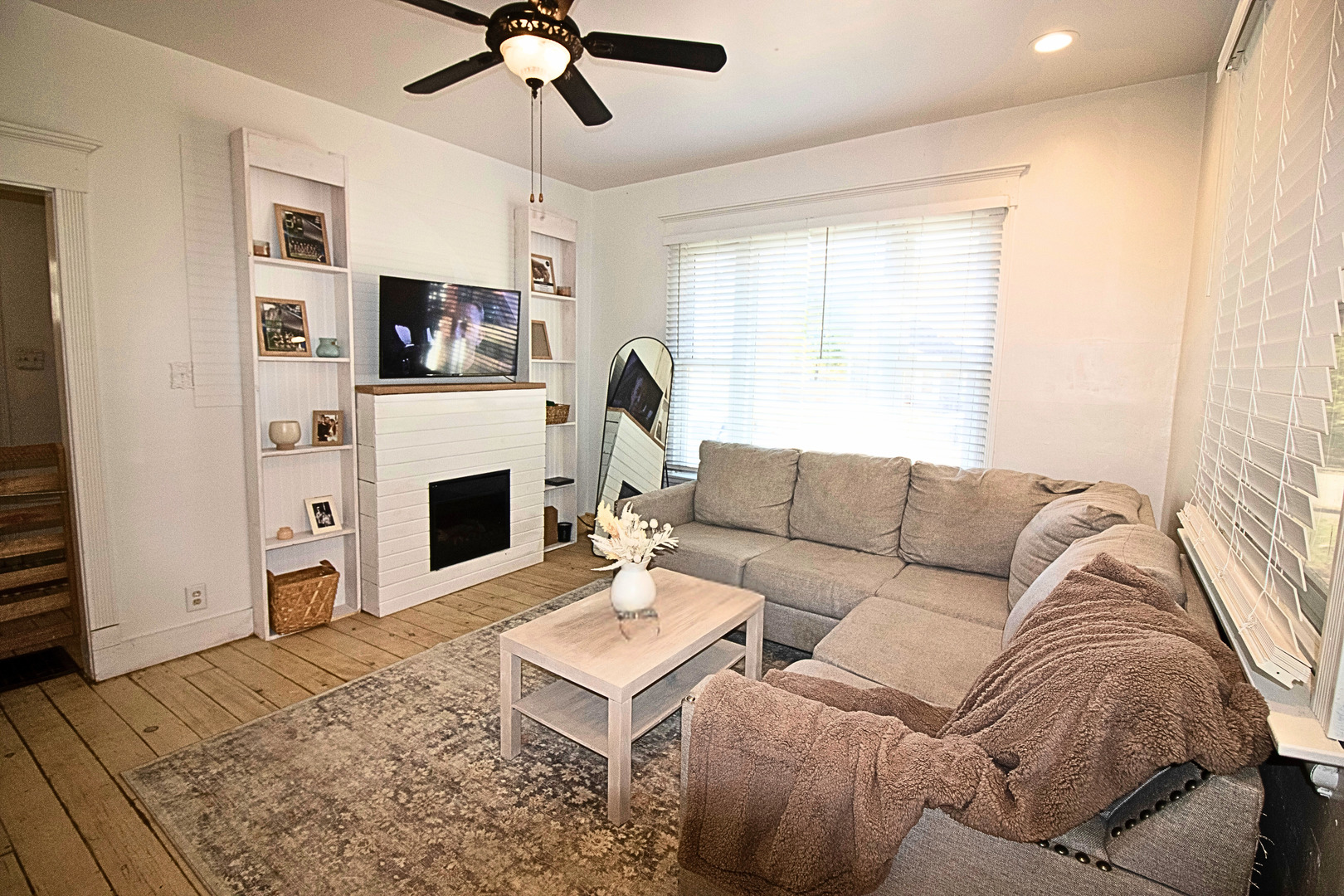 641 Aberdeen Street Marseilles, IL 61341 - Photo 6 of 28 a living room with furniture a fireplace and a flat screen tv