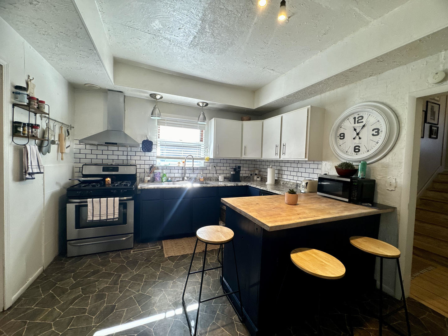 641 Aberdeen Street Marseilles, IL 61341 - Photo 10 of 28 a kitchen with a sink a stove and chairs