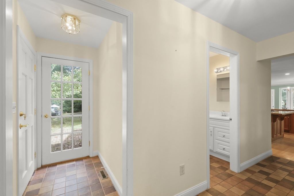 2 Tricia Road Falmouth, MA 02556 - Photo 20 of 39 a view of a hallway with natural light