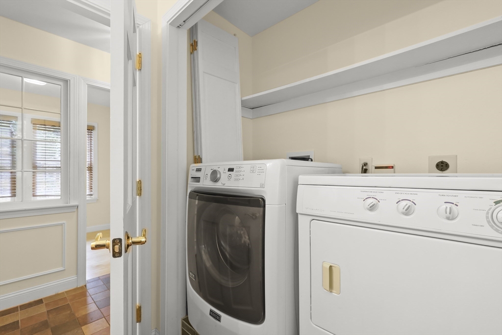 2 Tricia Road Falmouth, MA 02556 - Photo 22 of 39 a utility room with dryer and washer