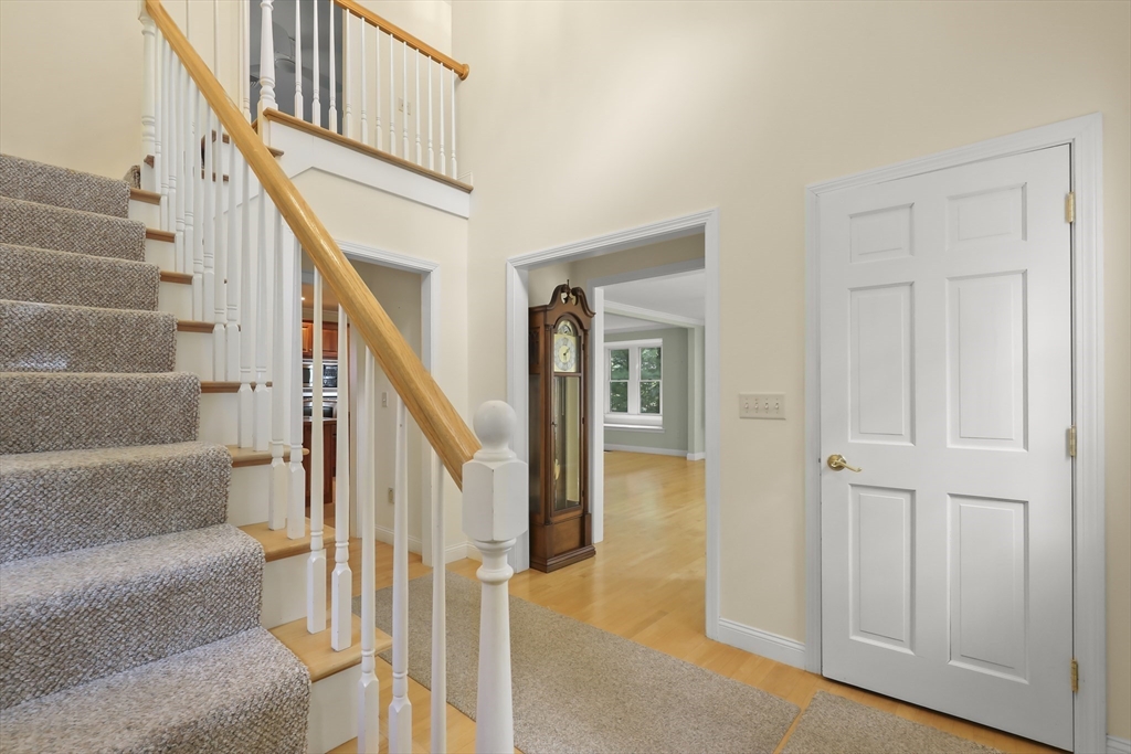 2 Tricia Road Falmouth, MA 02556 - Photo 23 of 39 a view of staircase with white walls and windows