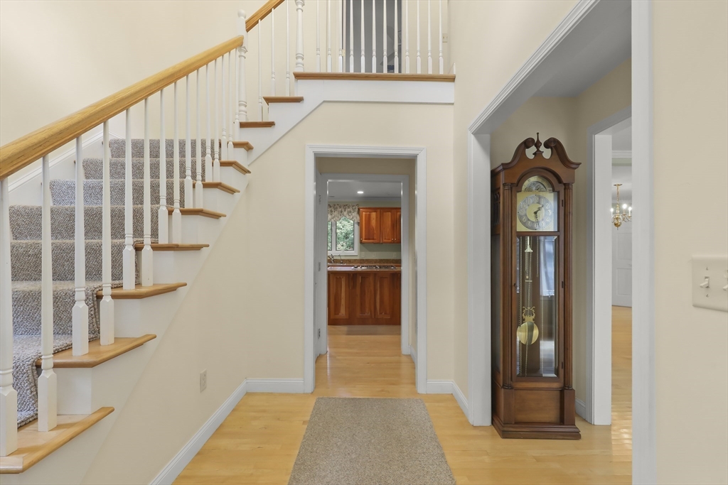2 Tricia Road Falmouth, MA 02556 - Photo 25 of 39 a view of staircase with white walls and a window