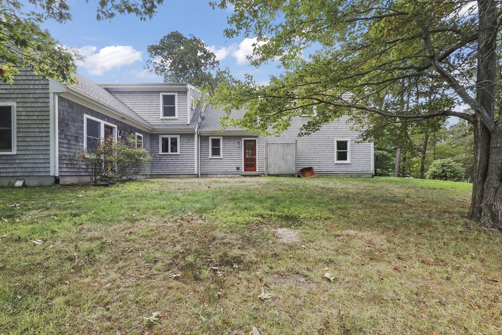 2 Tricia Road Falmouth, MA 02556 - Photo 34 of 39 a view of a house with a yard and tree s
