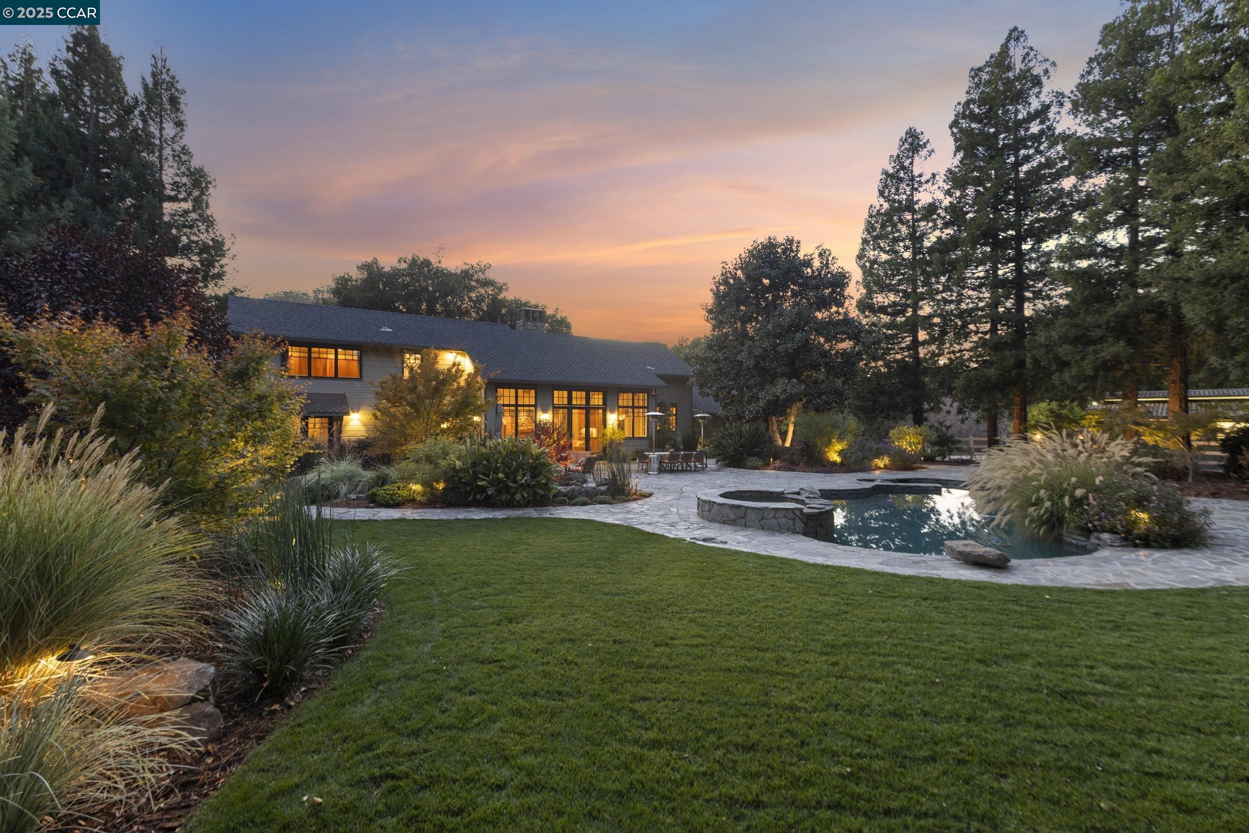 350 Pine Creek Road Walnut Creek, CA 94598 - Photo 1 of 59 a view of a park that has a sign board large trees