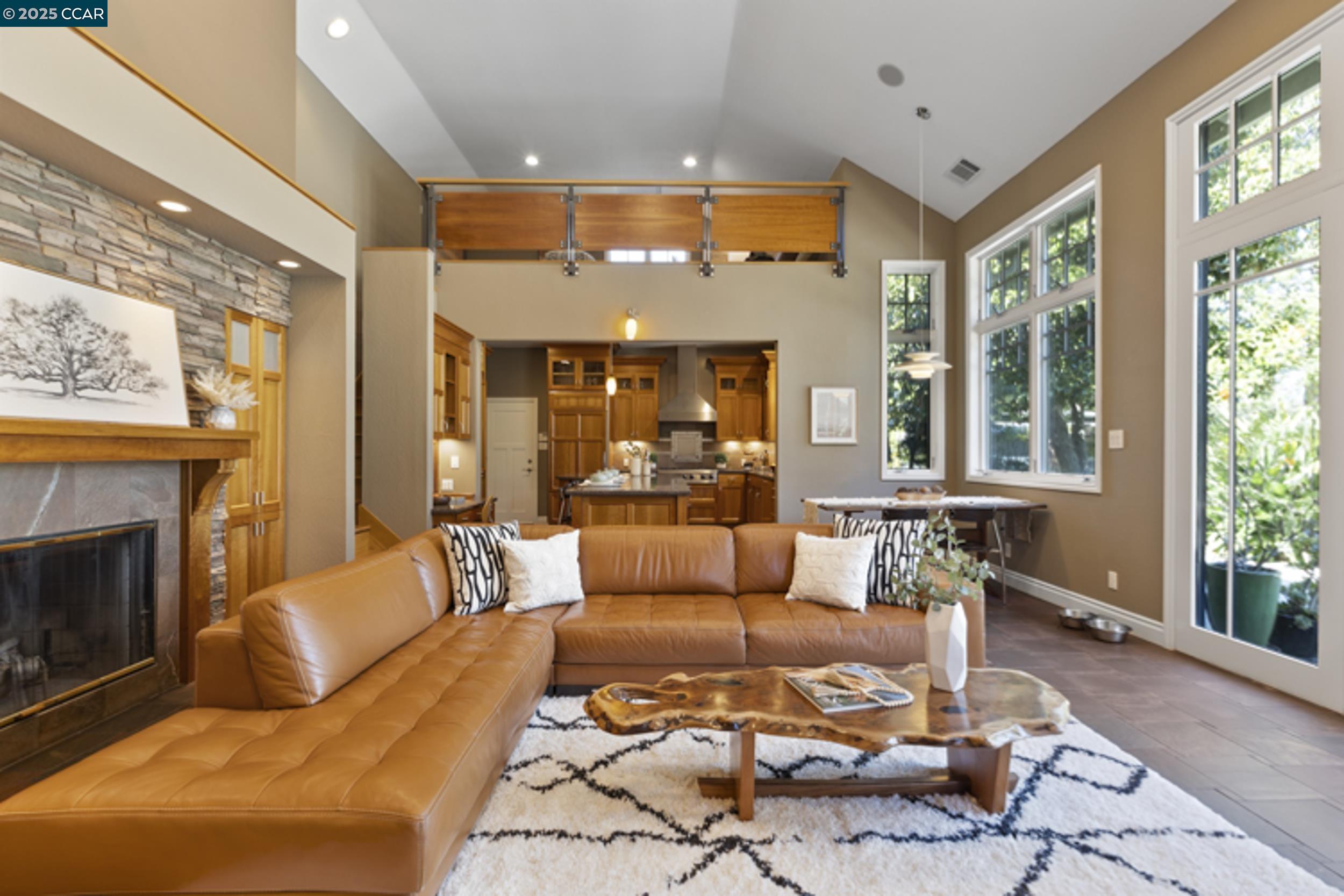 350 Pine Creek Road Walnut Creek, CA 94598 - Photo 16 of 59 a living room with furniture fireplace and a large window