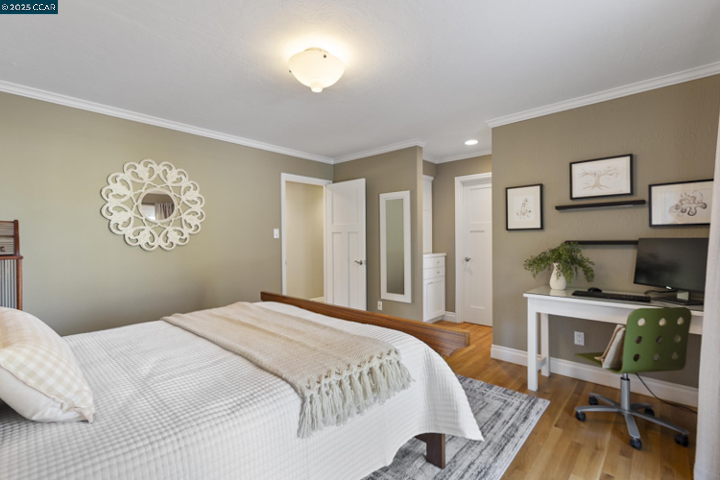 350 Pine Creek Road Walnut Creek, CA 94598 - Photo 33 of 59 a bedroom with a bed and a table in it with window