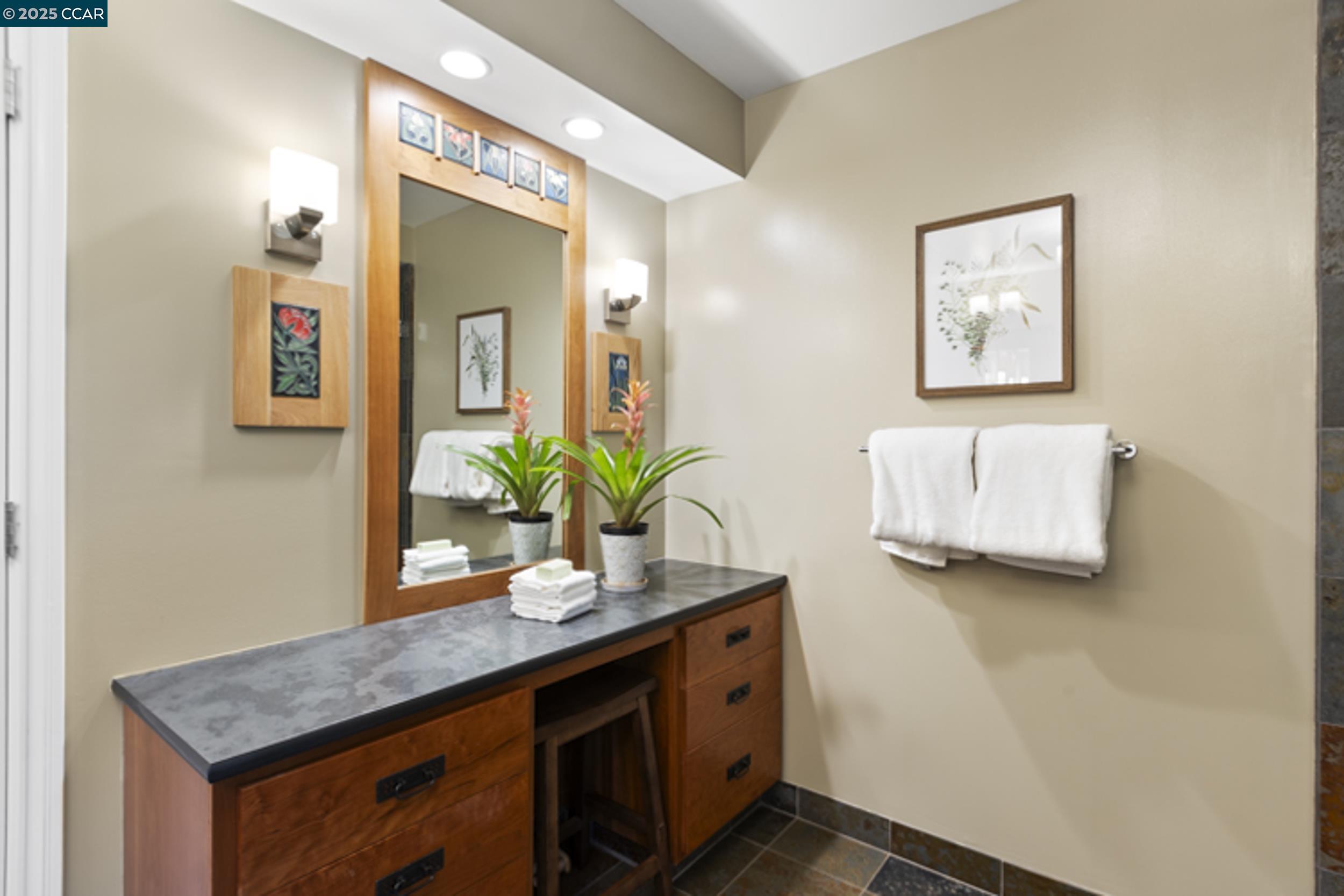 350 Pine Creek Road Walnut Creek, CA 94598 - Photo 35 of 59 a room with sink and mirror