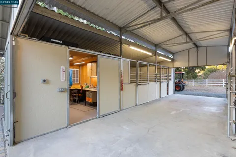 a view of swimming pool from a lounge chair