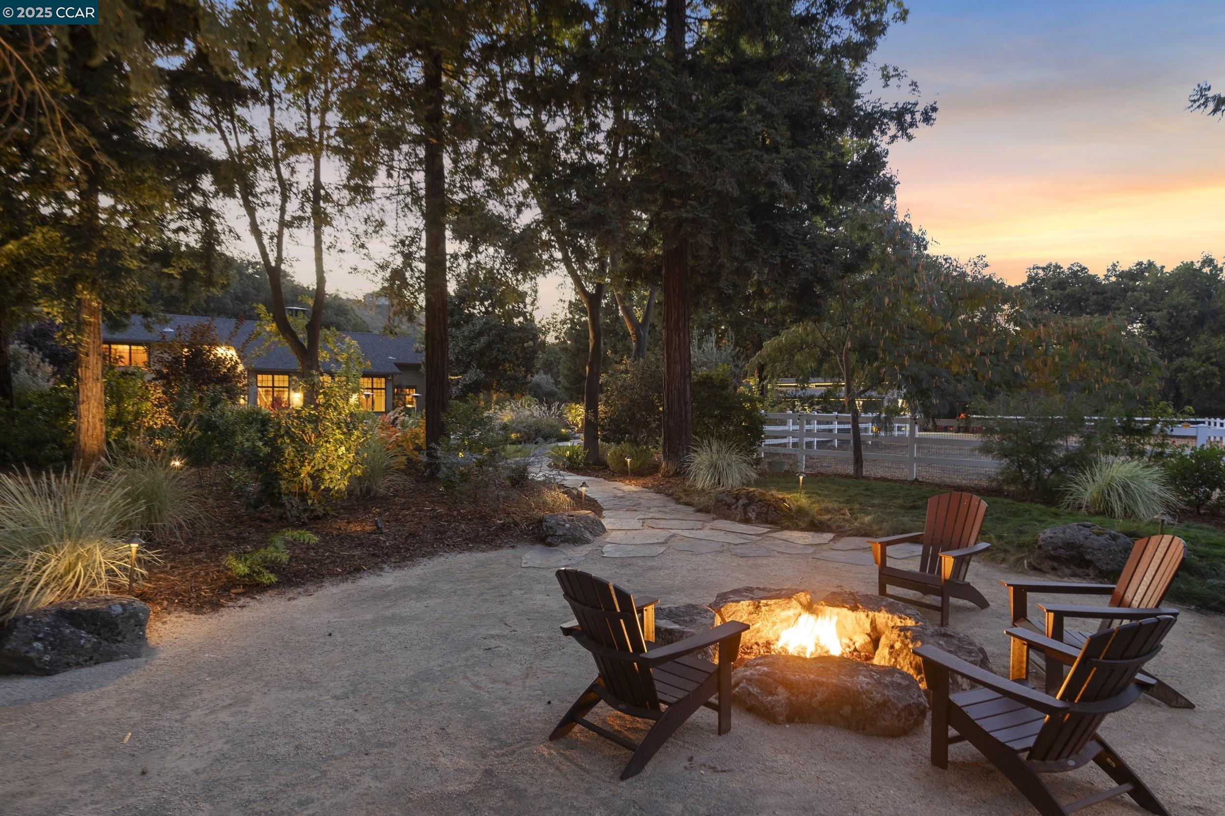350 Pine Creek Road Walnut Creek, CA 94598 - Photo 47 of 59 a view of backyard with outdoor seating and trees