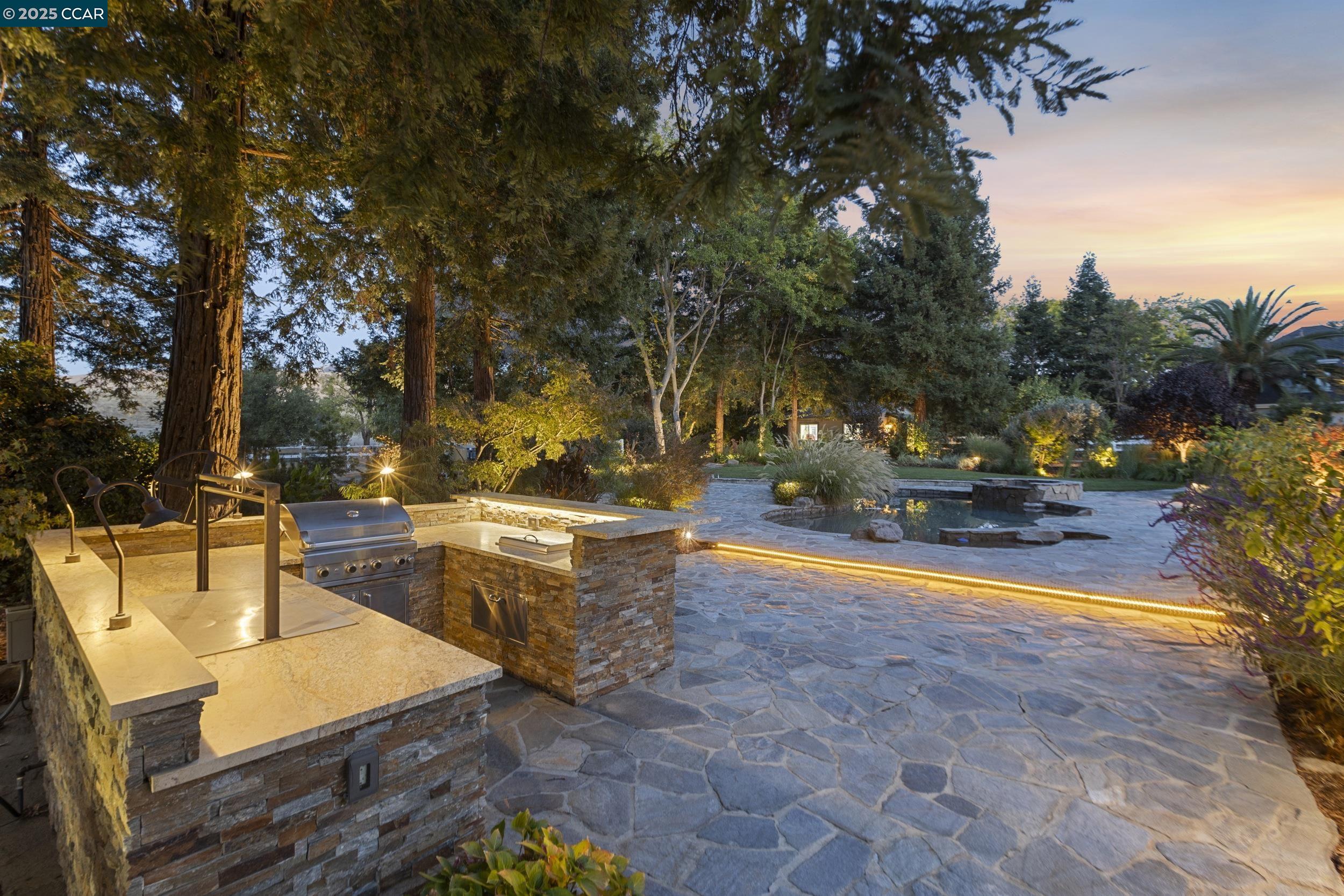 350 Pine Creek Road Walnut Creek, CA 94598 - Photo 49 of 59 a view of swimming pool with chairs and trees