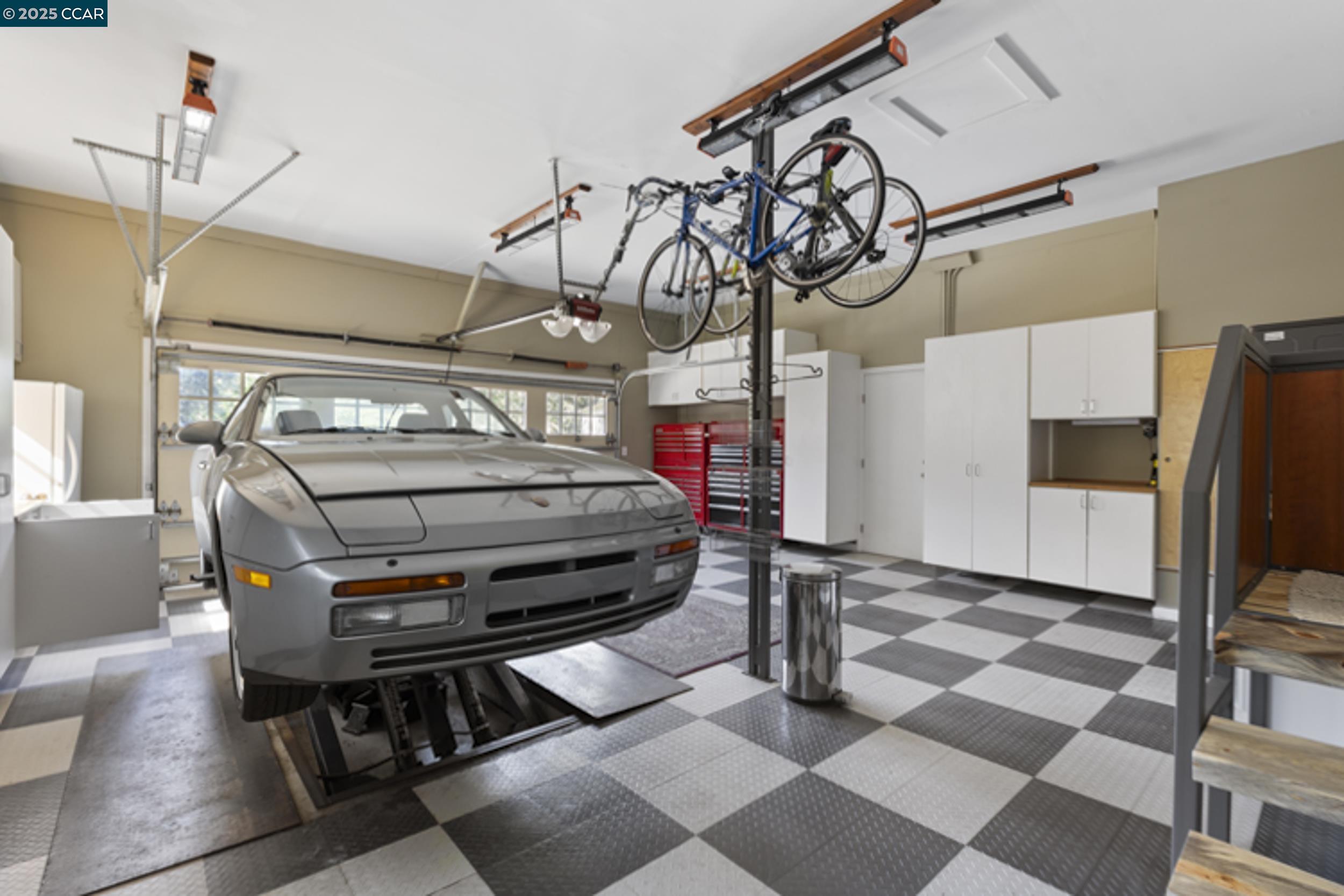 350 Pine Creek Road Walnut Creek, CA 94598 - Photo 51 of 59 a view of a storage & utility room with racks on the wall