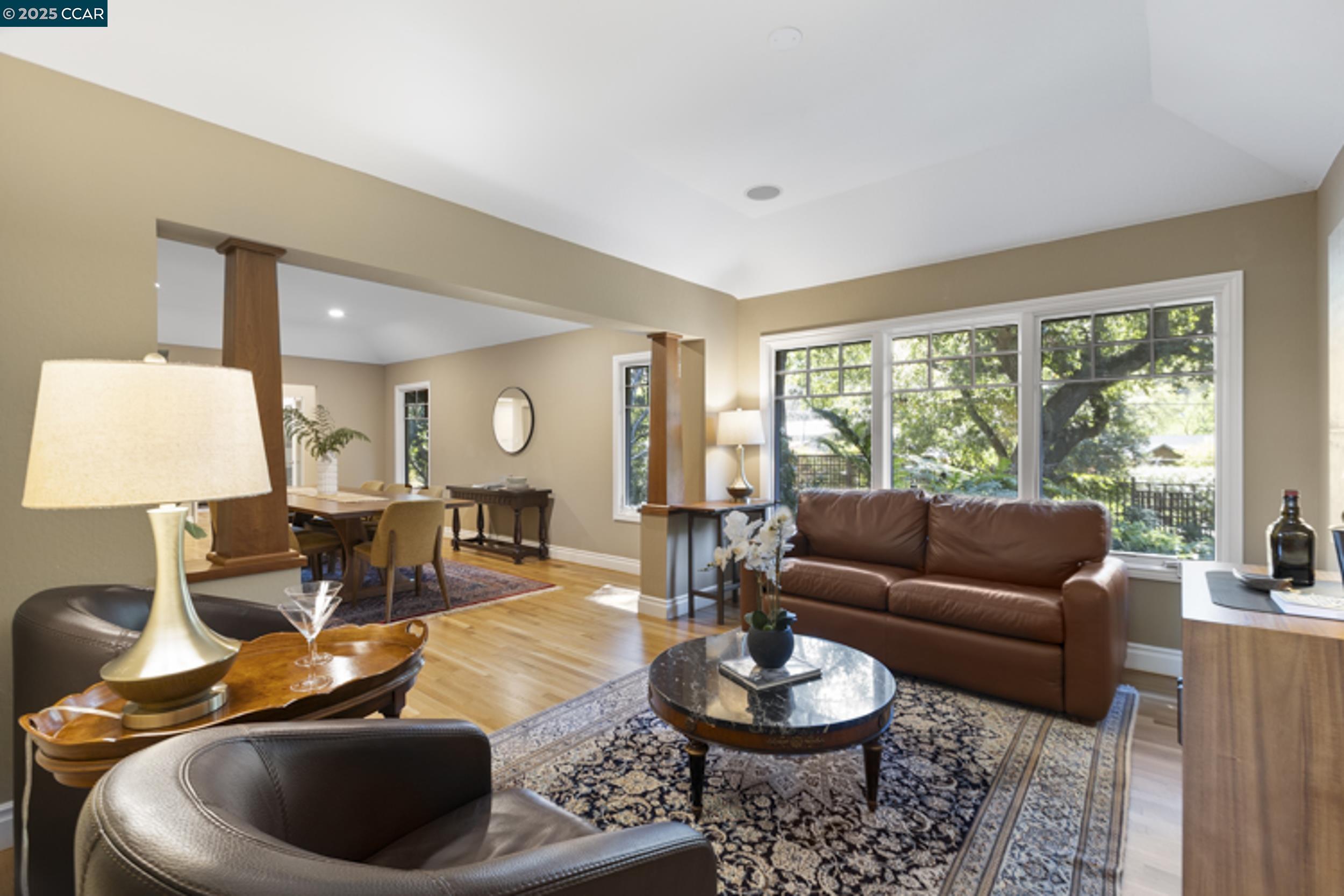 350 Pine Creek Road Walnut Creek, CA 94598 - Photo 7 of 59 a living room with furniture and a large window